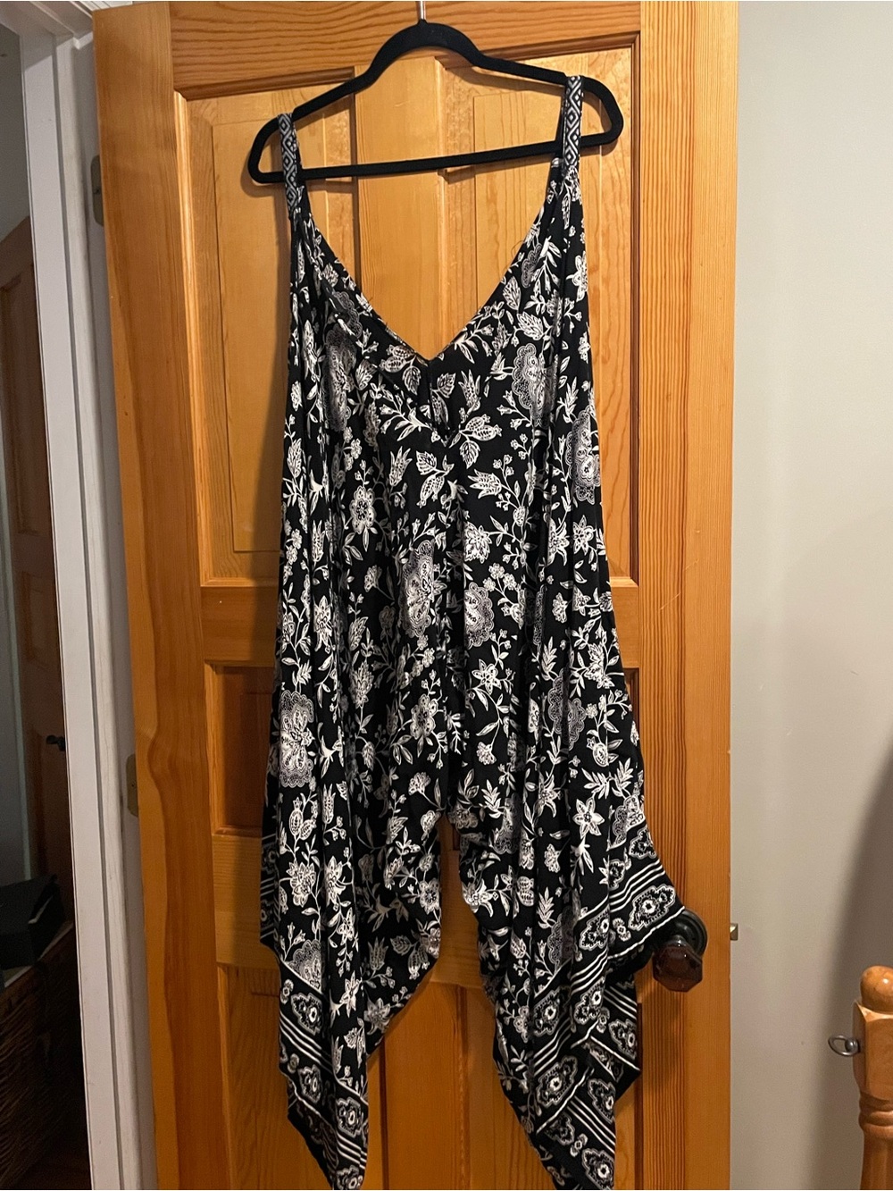 Angie Black and White Floral Handkerchief-Hem Jumpsuit